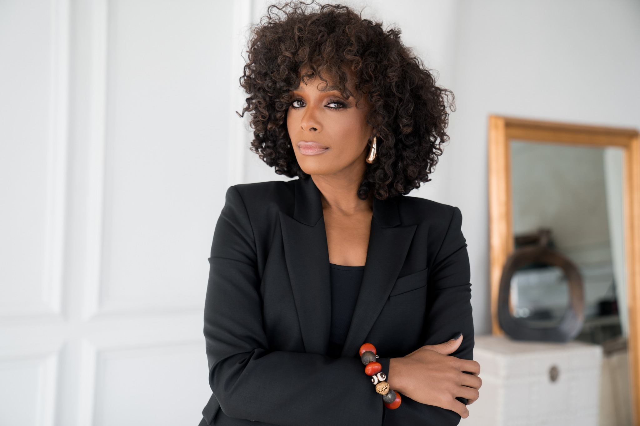 Dr. Kimberly Ellison in a black suit